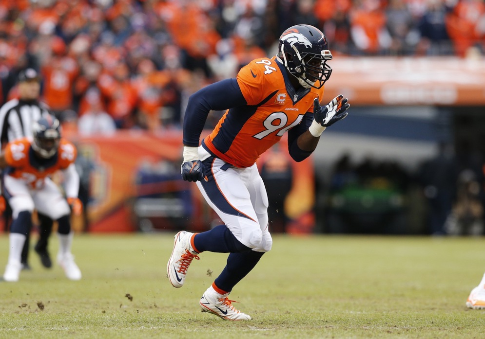 Denver Broncos defensive end DeMarcus Ware is seen in action during the NFL divisional playoff game against the Indianapolis Colts at Sports Authority Field at Mile High on Sunday, Jan. 11, 2015 in Denver, CO. The Colts defeated the Broncos 24-13. (AP Photo/Ric Tapia)