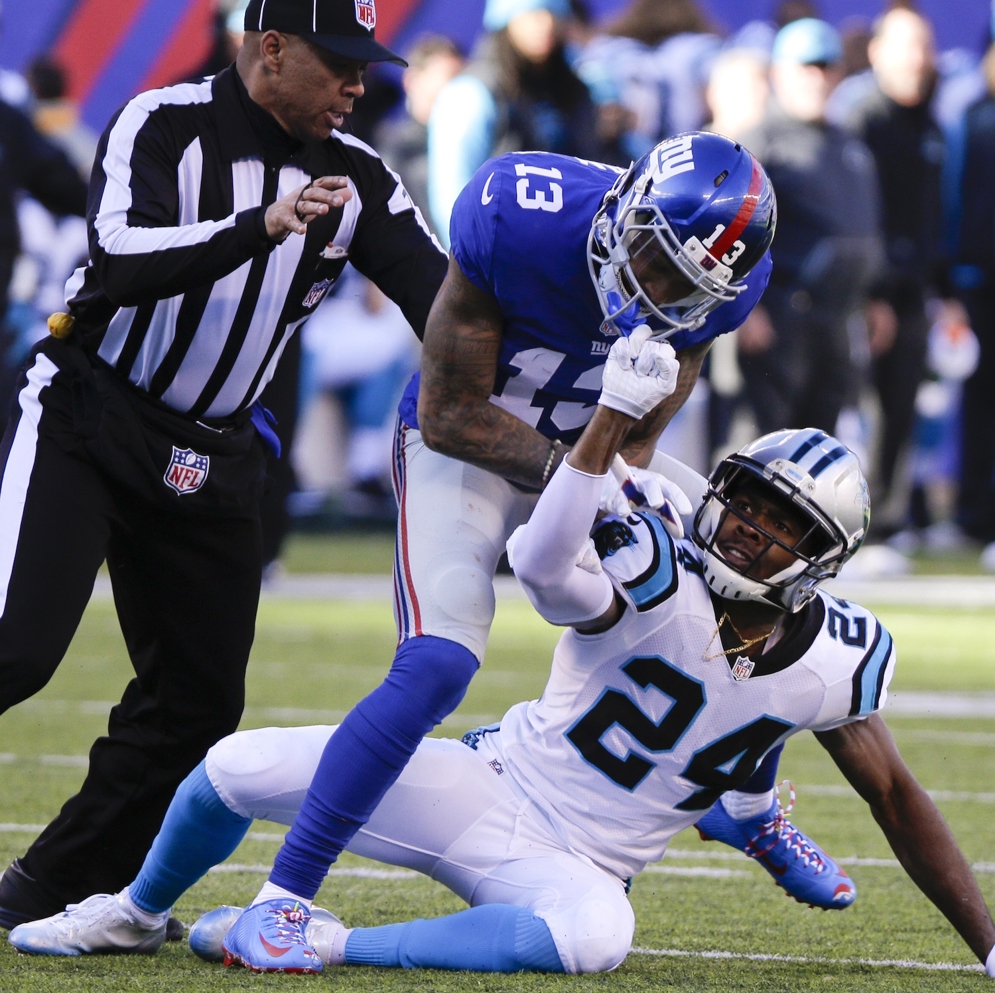 El esquinero de los Carolina Panthers, Josh Norman, y el receptor de los New York Giants, Odell Beckham Jr., se ponen en guardia en un partido de la semana&#xA0;15 durante la temporada de la NFL de 2015. Norman recibi&#xF3; una multa de USD&#xA0;26.044 por infracciones de faltas personales, y Beckham Jr. fue suspendido por un partido. (Evan Pinkus v&#xED;a AP)