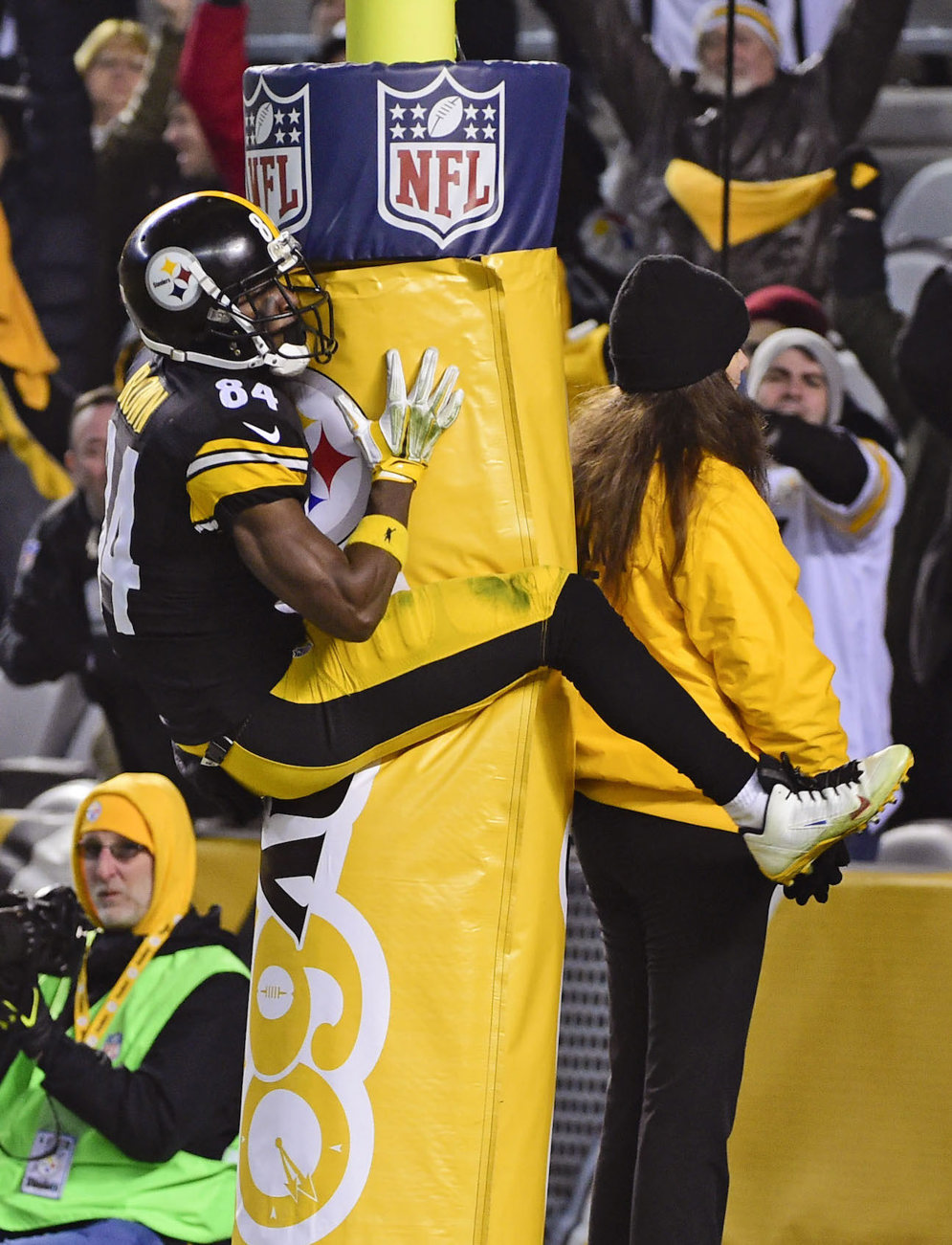 Pittsburgh Steelers wide receiver Antonio Brown was fined $11,576 for jumping on the goal post to celebrate a touchdown in a 2015 game against the Indianapolis Colts. Brown received an unsportsmanlike penalty for using the goalpost as a prop. (AP Photo/Fred Vuich, File)